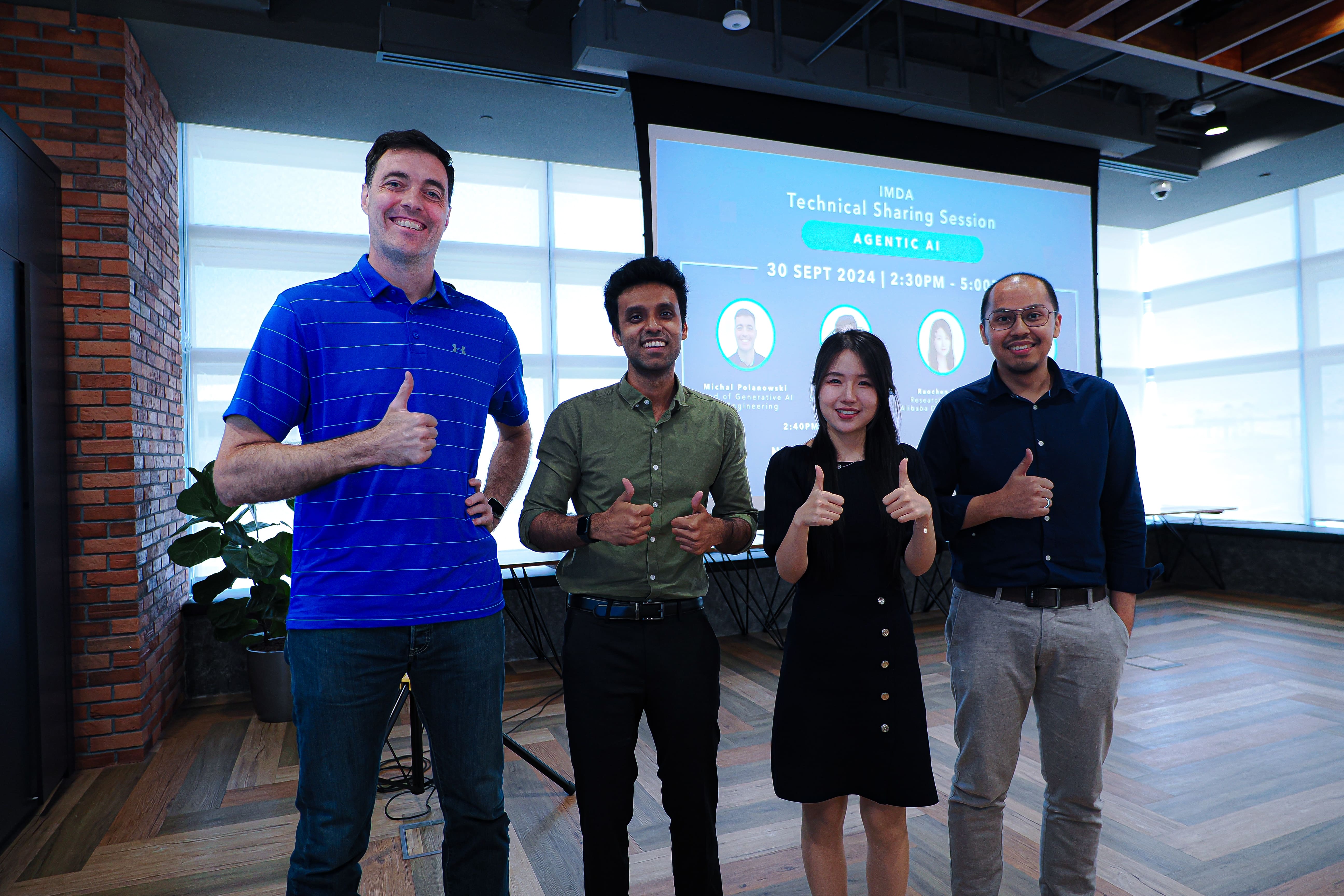 Four speakers in front of a screen announcing the IMDA Technical Sharing Session on Agentic AI, 30 September 2024